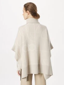 Ponchos & Kimonos Cape Dames Camel -Winterkledingwinkel Voor Dames 0a2c0a8f2c4e52eb5769c64764a6f30f