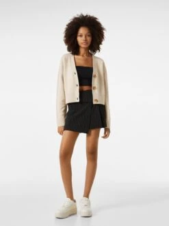 BERSHKA Vesten Gebreid Vest Dames Sand -Winterkledingwinkel Voor Dames fd66a73a6f64452712c2eb22447d5692